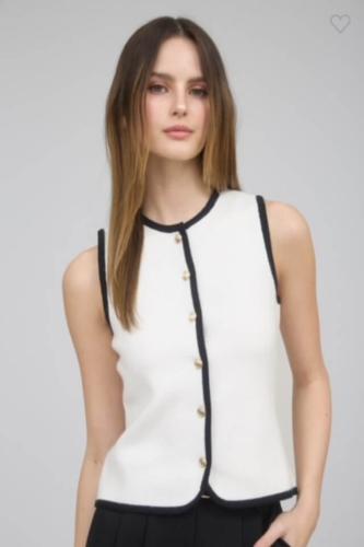 white and black knit vest